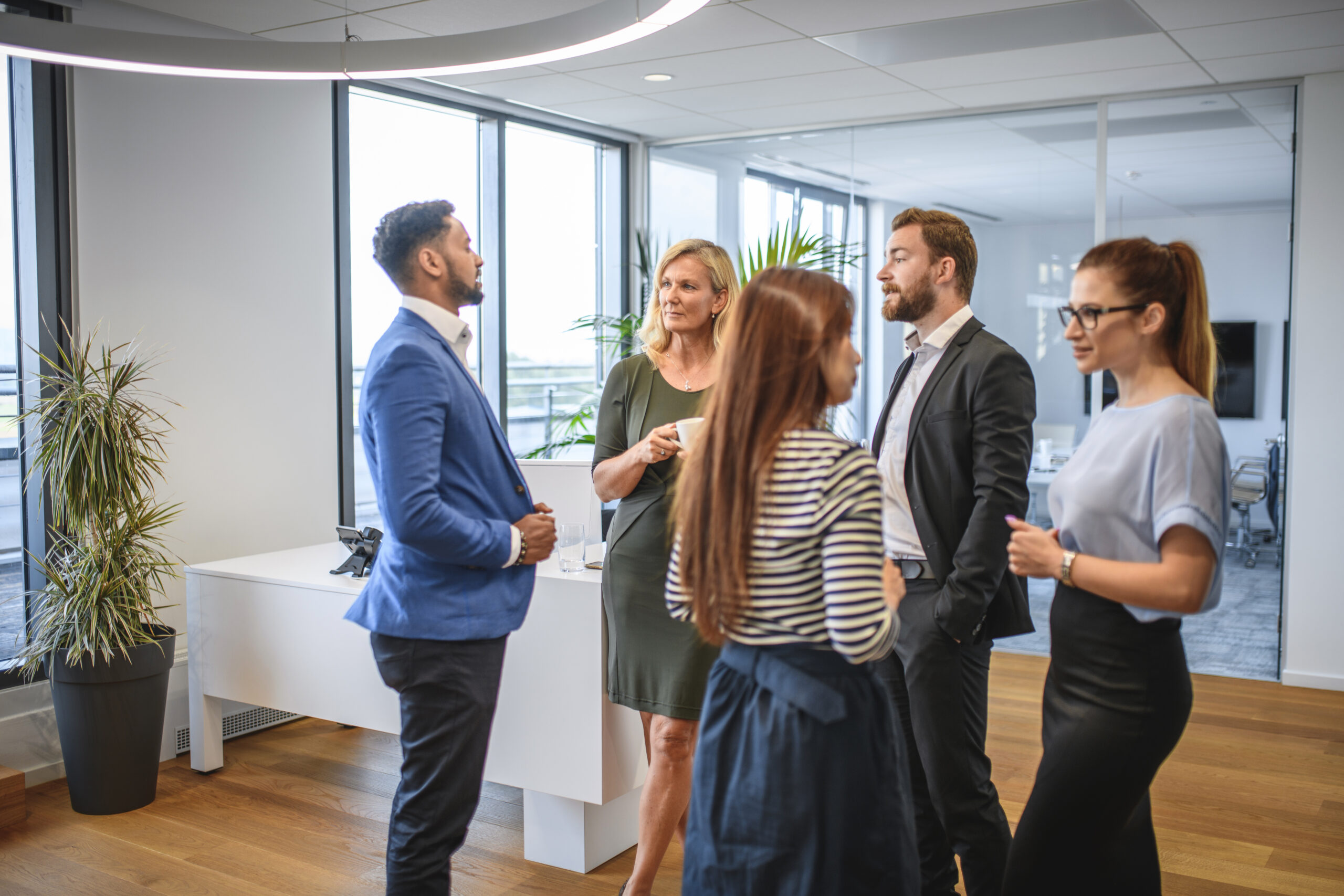 Business Executives Conversing During Seminar Break